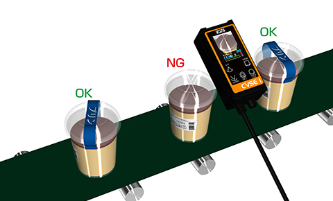 Detecting the presence of the label on the lid